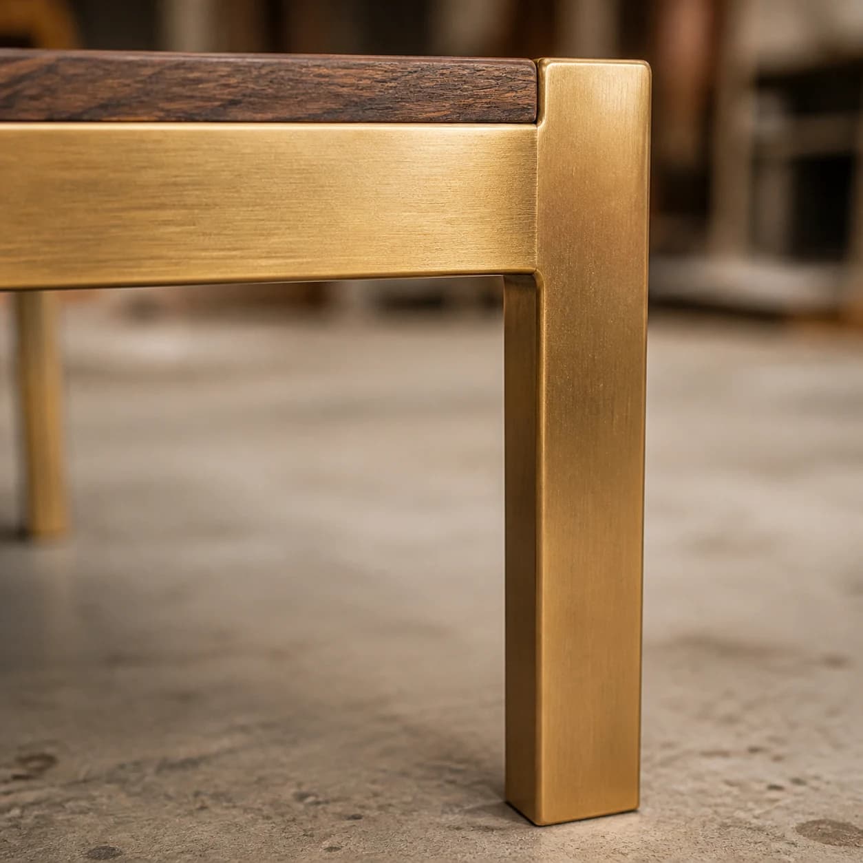 Brushed brass metal detail on furniture leg